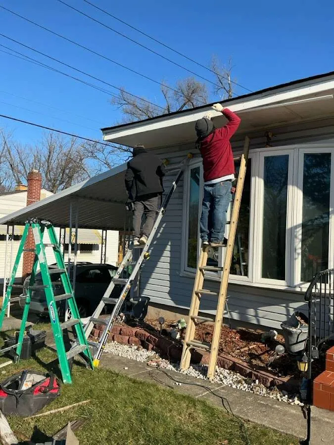 Restoration crew performing exterior repair in Athol