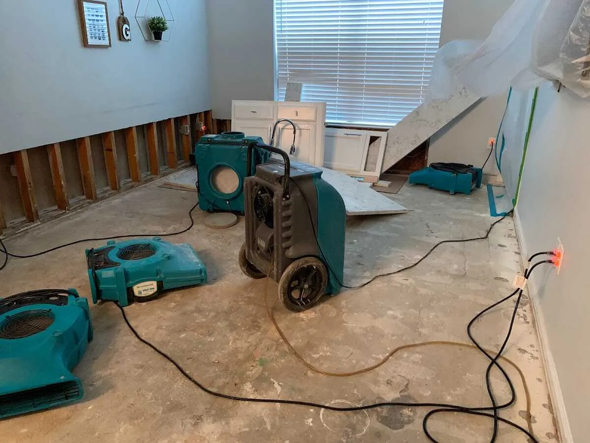 Dehumidifier in flood-cut room for Water Damage Restoration in Athol